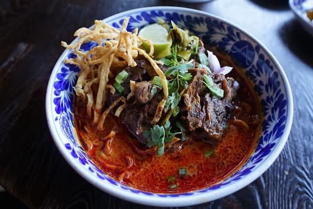 Khao Soi Beef Cheeks with Egg Roll.